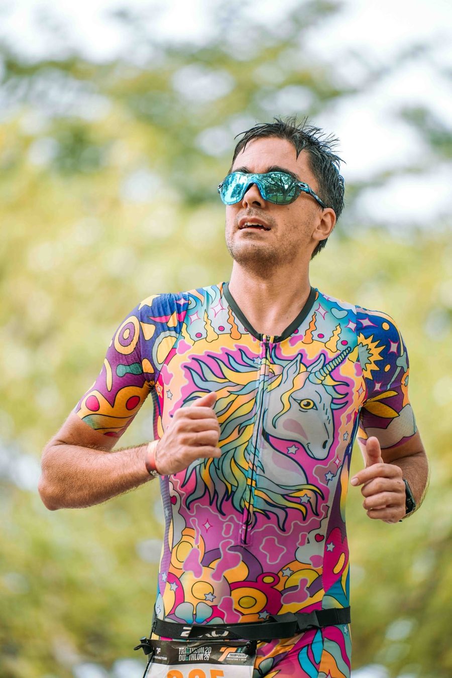 Alf running mid-race in a Fierce Unicorn trisuit